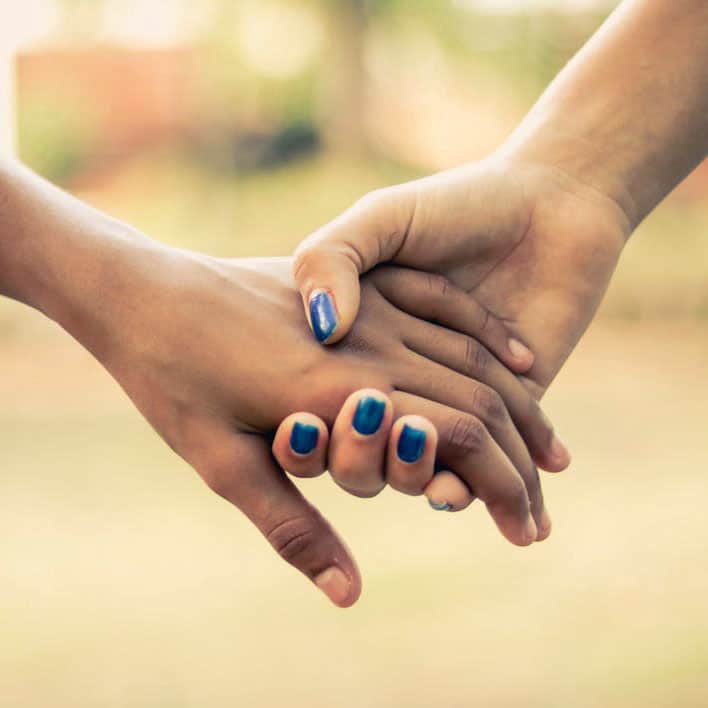 support two clasped hands